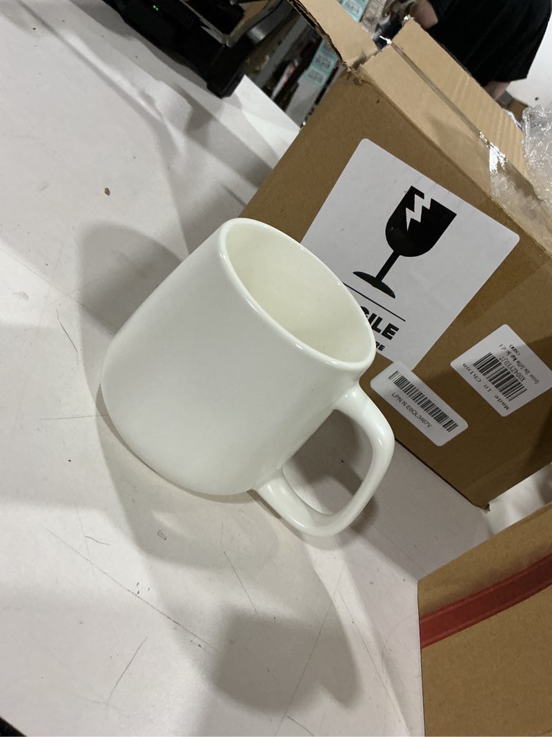 Condition photo showing Good Condition for 4 pack coffee mugs, ceramic cups, 12oz, white | chip-resistant coffee mugs with ergonomic handle, microwave and dishwasher safe, suitable for latte, cappuccino, hot tea