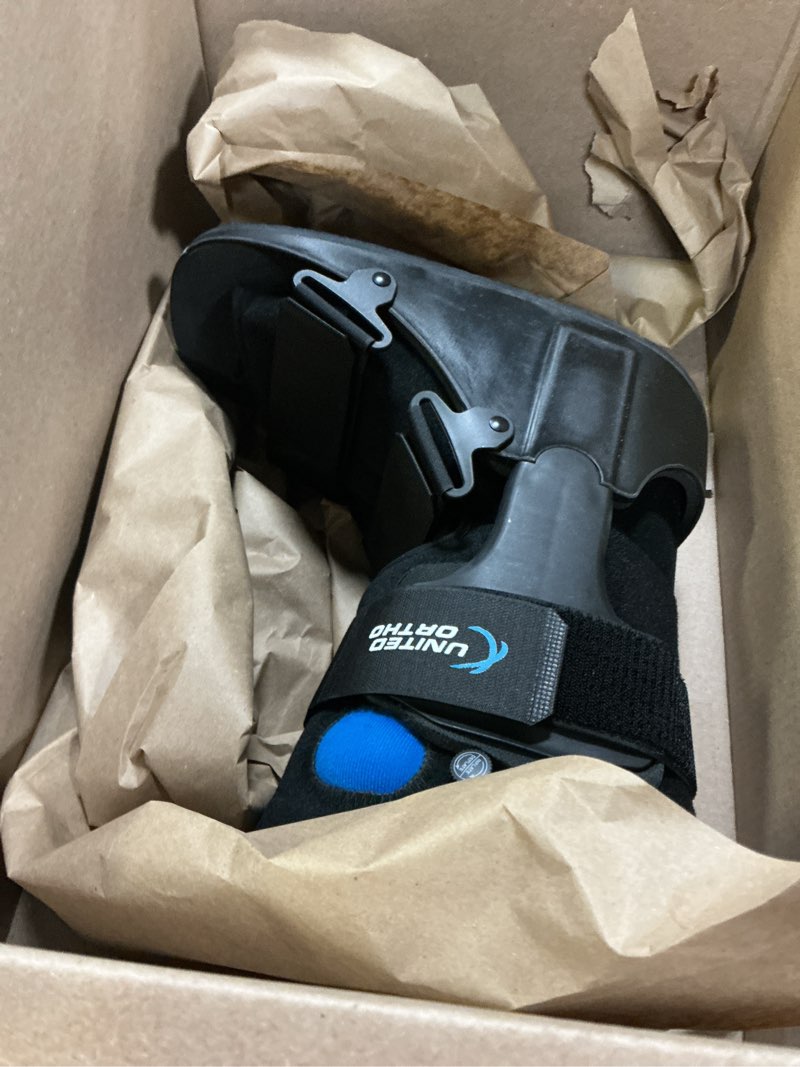 Condition photo showing Good Condition for united ortho short air cam walker fracture boot, large, black black large boot