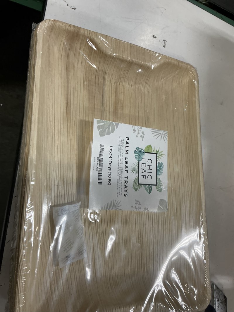 Condition photo showing New/Like New for chic leaf compostable palm leaf serving trays, 10x14 inch rectangular disposable platters for charcuterie, parties, and catering, heavy-duty microwave safe natural wood-look plates, 10 pack 10"x14" (pack of 10) 10