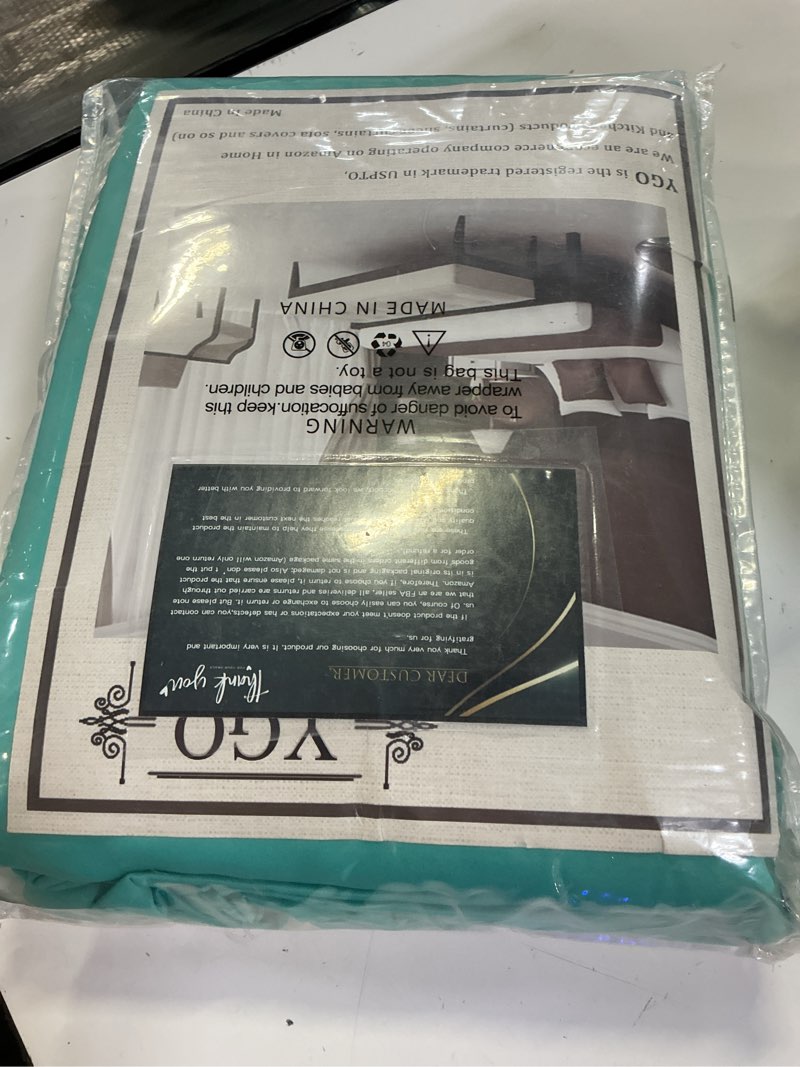 Condition photo showing New/Like New for ygo turquoise curtains for bedroom living rooms thermal insulated innovated microfiber blackout window panels light blocking drapes grommet top 52x84 inch 2 panels 52"w x 84"l (pack of 2) turquoise