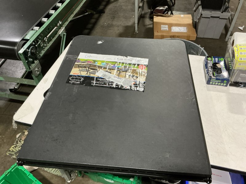 Condition photo showing Good Condition for mainstays 6 foot bi-fold plastic folding table, black