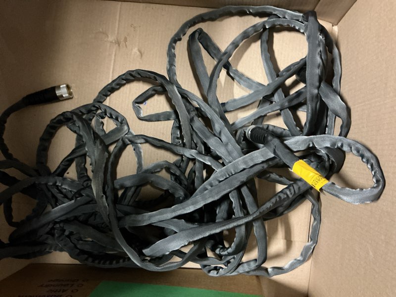 Condition photo showing As Is for dark gray expandable garden hose - 25 ft