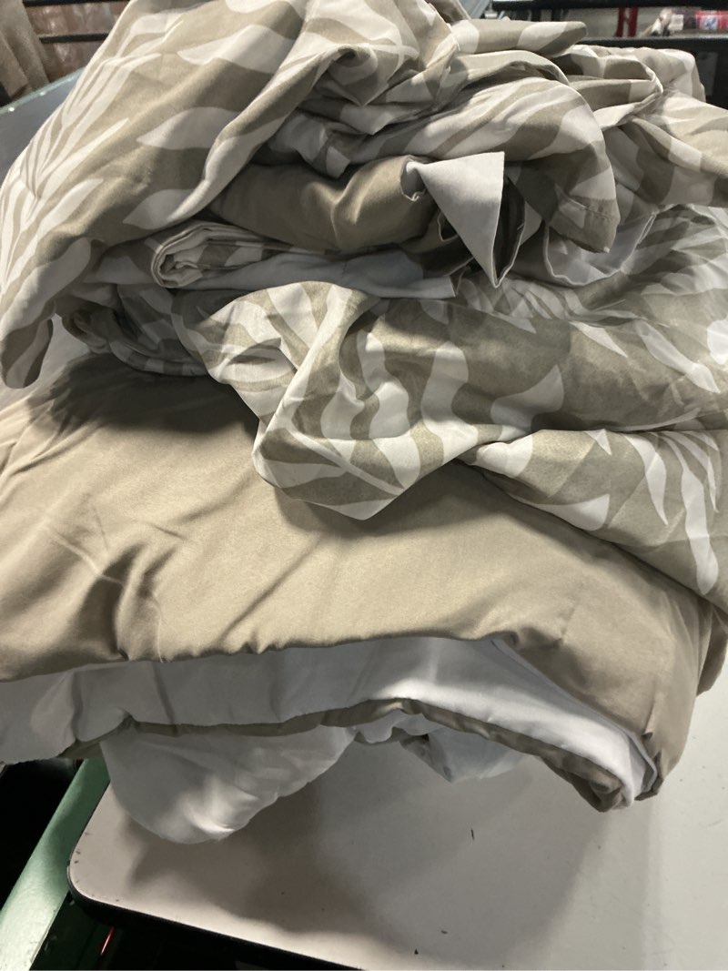 Condition photo showing Good Condition for mainstays 7 piece reversible bed in a bag comforter set with sheets, beige palm, king