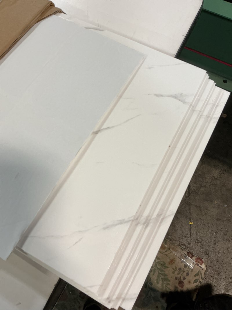 Condition photo showing New/Like New for haimin wall panels peel and stick 10 pieces 23.6x11.8in (19.4 sq. ft. coverage) lightweight backsplash marble look tile (not real marble) ideal for kitchen bathrooms living rooms bedrooms (white-lyb)