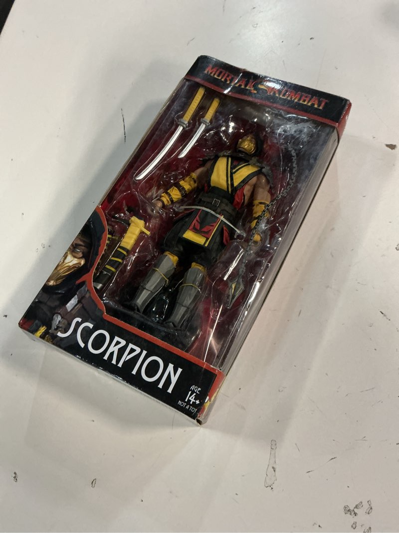 Condition photo showing New/Like New for mcfarlane toys mortal kombat - scorpion action figure