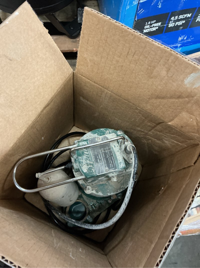 Condition photo showing As Is for zoeller 1/3 hp submersible sump pump - 48 gpm, basement and crawl space water removal - cast iron construction with non-clogging vortex impeller, 115v (1052-0001)