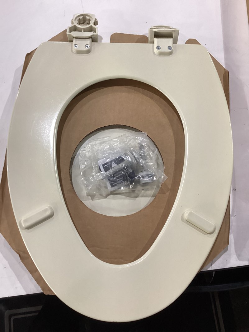 Condition photo showing New/Like New for bemis 1500ec 146 almond elongated molded wood toilet seat with easy-clean & change hinge