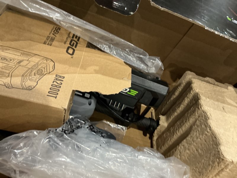 Condition photo showing As Is for ego power+ multi-head system with line iq, powerload 56-volt 17-in straight shaft attachment capable battery string trimmer 5 ah (battery included) (charger included)