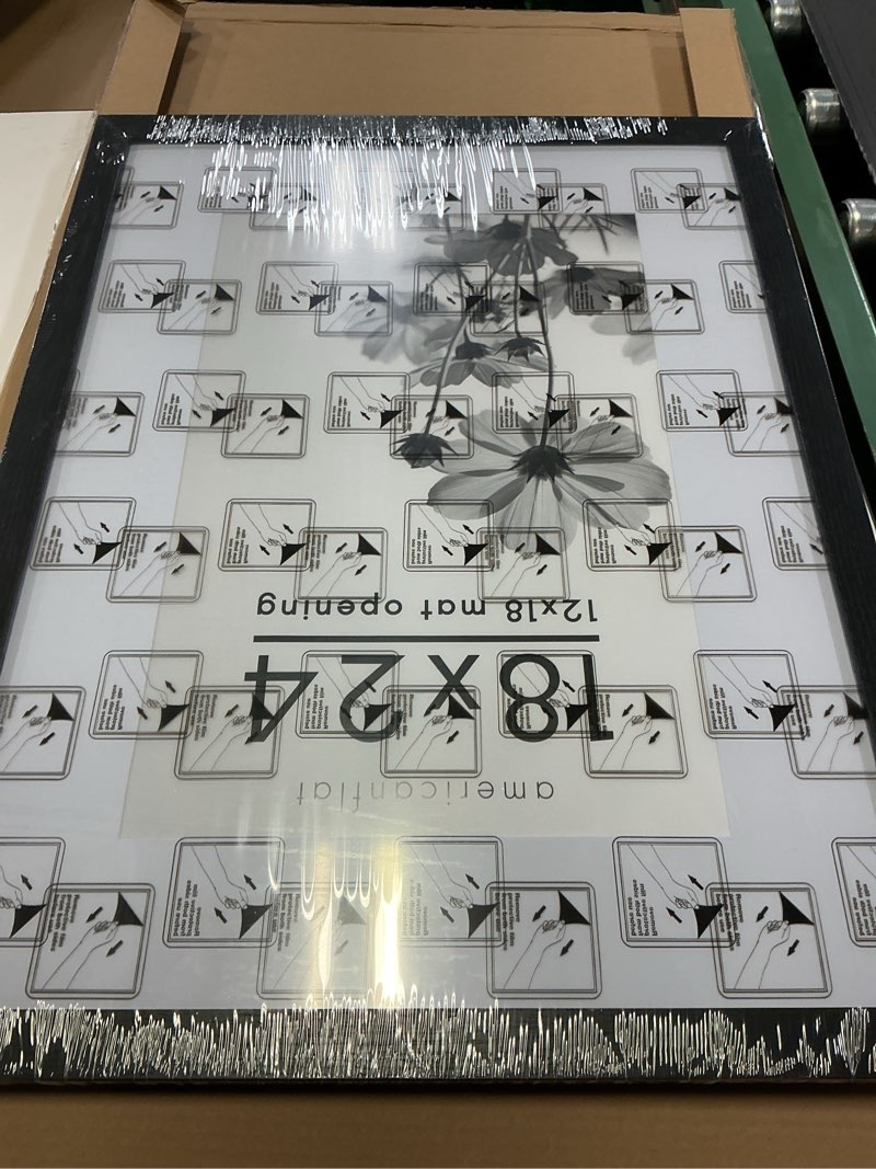 Condition photo showing New/Like New for Americanflat 12x18 Poster Frame with Polished Plexiglass - Black Picture Frame - Wide Photo Frames Made of Engineered Wood for Vertical or Horizontal Wall Display - Epic Collection - Black Black 12x18