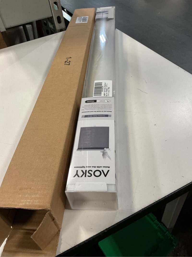 Condition photo showing New/Like New for aosky cordless roller shades blackout blinds for windows room darkening rolled up shades with spring system, uv protection window shades door blinds for home and office (27" w x 72" h, ivory) 27"w x 72"h ivory