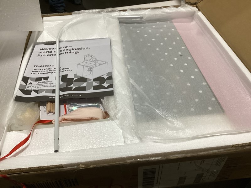 Condition photo showing Good Condition for Olivia's Little World 6-in-1 Wooden Baby Doll Changing Station with Crib, Changing Table, High Chair, Double-Door Closet, Sink and Washing Machine, Multicolored Pink/Grey
