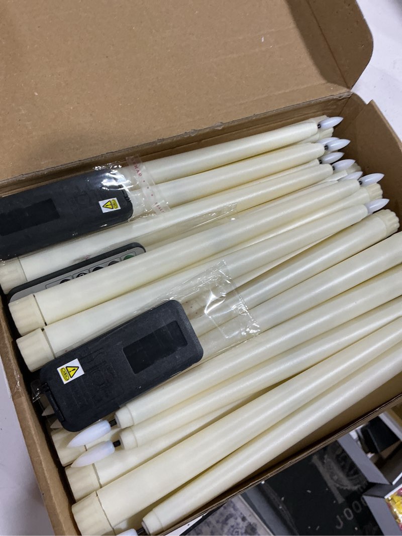 Condition photo showing Good Condition for reginary 48 pcs flameless taper candles with 4 remote, battery operated flickering flameless taper candles 3d wick fire led faux wax lights for wedding christmas holiday(ivory,11 inches) ivory 11 inches