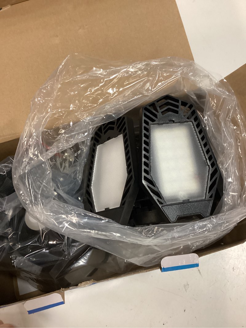 Condition photo showing Good Condition for tanbaby 2 pack led garage lights, deformable ceiling light, 30000lm 6500k | e26/e27 screw-in garage light bulb with 6+1 adjustable panels for garages, basements, workshops, and storage areas 6+1 2 pack white-light