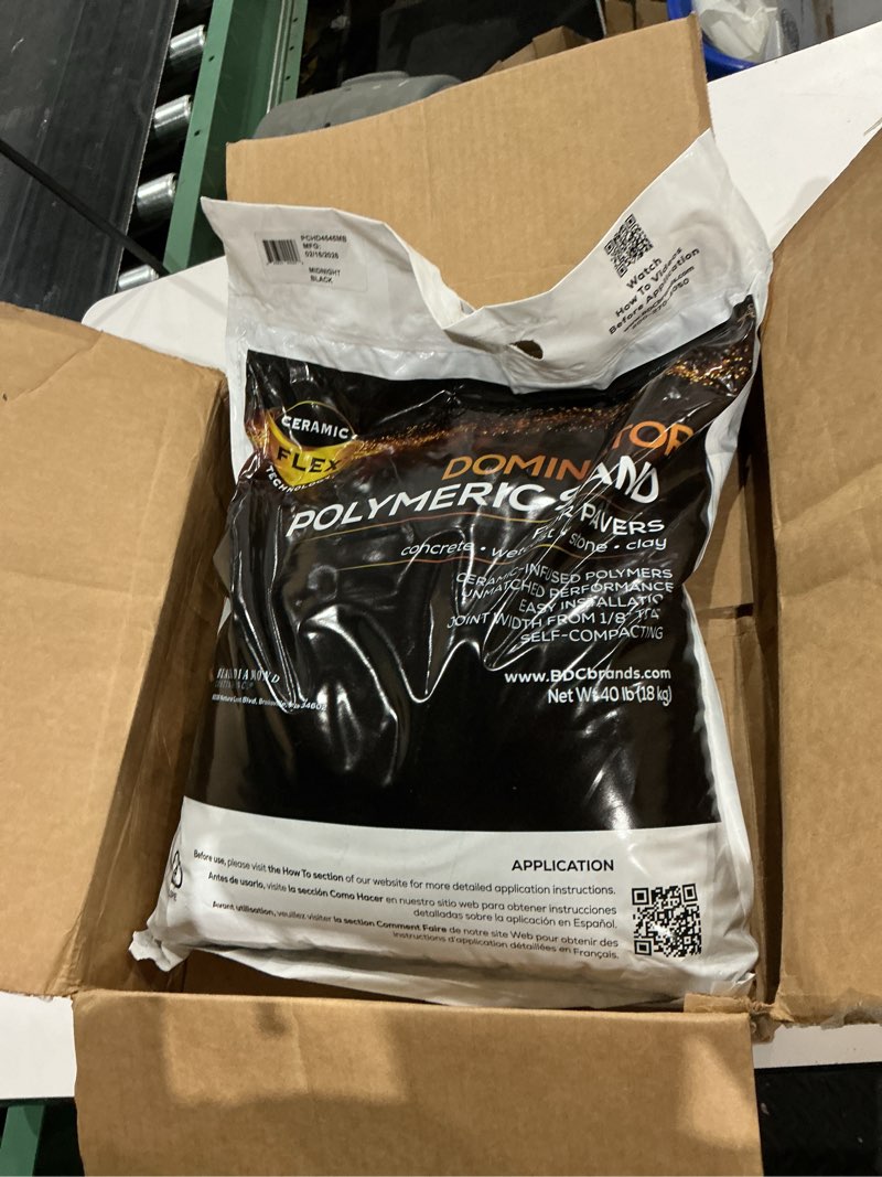 Condition photo showing New/Like New for 40 pound midnight black dominator polymeric sand with revolutionary ceramic flex technology for stabilizing paver joints/gaps, 1/8” up to 4”, professional grade results
