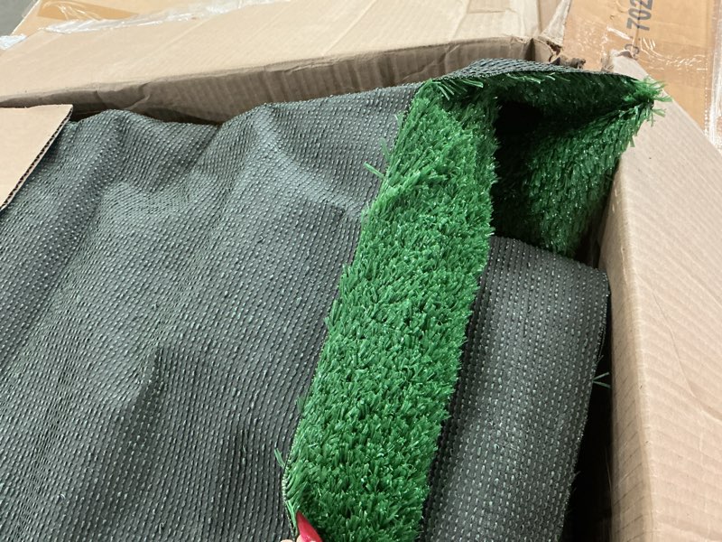 Condition photo showing As Is for Garland Rug Artificial Grass 7 Ft. X 10 Ft. Large Indoor/Outdoor Area Rug Green -Lush Green, Durable, and Low-Maintenance for Patios, Lawns, and More Green 7' x 10' (Rectangular)