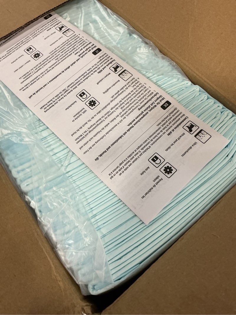 Condition photo showing New/Like New for amazon basics leak-proof dog and puppy potty training pee pads with quick-dry 5-layer super absorbent design, regular size 22 x 22 inch, blue & white, 100 count regular 100 count