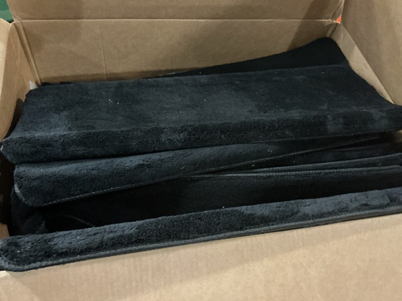 Condition photo showing Good Condition for pure era carpet stair treads ultra plush 9.5" x 30"soft bullnose indoor stair protectors pet-friendly non-slip skid resistant tape free washable reusable(14 pieces,black) black 14 pieces with bullnose