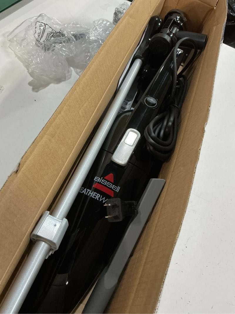 Condition photo showing As Is for bissell featherweight stick lightweight bagless vacuum with crevice tool, 2033m, black featherweight (black)