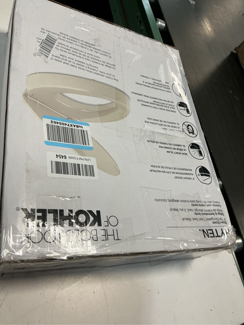 Condition photo showing As Is for KOHLER 25875-96 Hyten 3" Height, Elevated Soft Close Elongated Toilet Seat, Contoured Seat with Grip-Tight Bumpers, Quick-Attach Hardware, No Slam Toilet Seat, Biscuit Biscuit Elongated