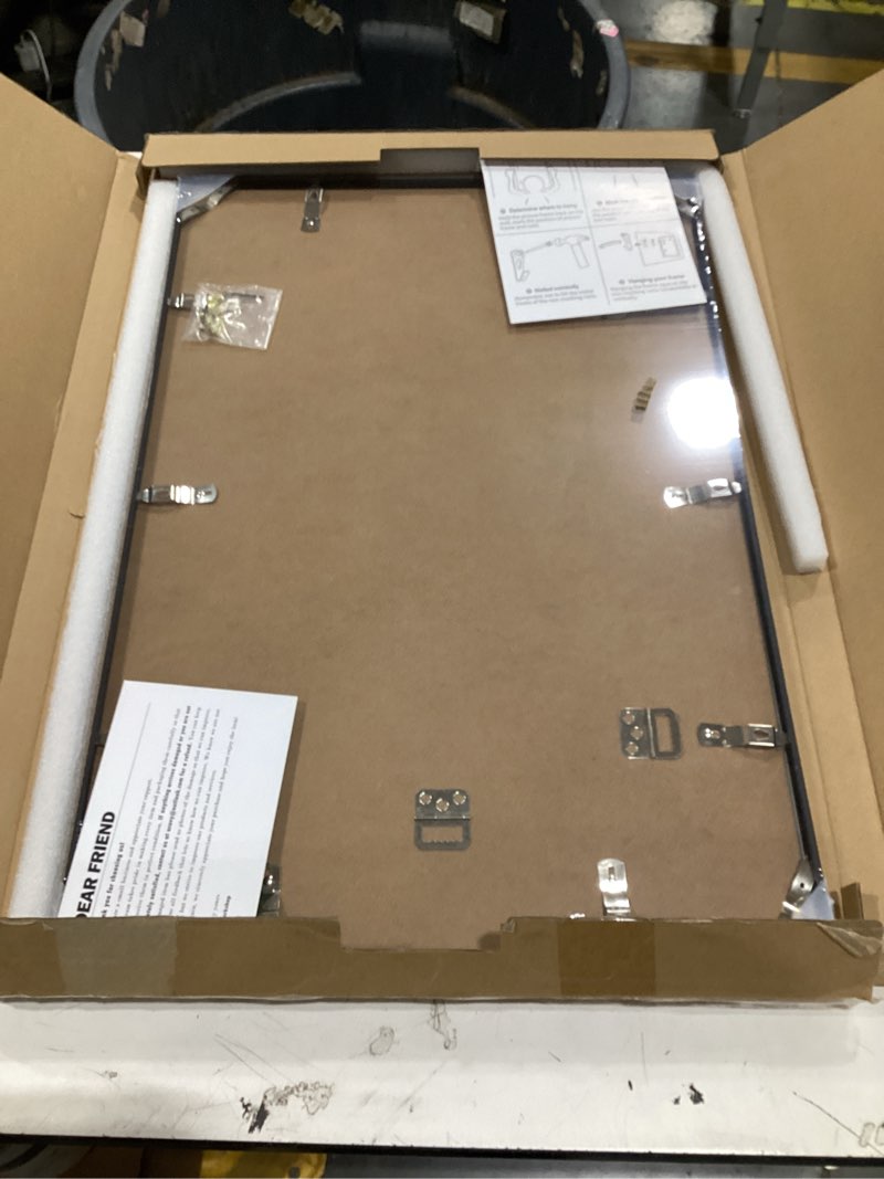 Condition photo showing New/Like New for acovy 16x24 picture frame, aluminum 16x24 frame matted to 12x18, 16 x 24 poster frame with hd tempered glass, metal frame for wall, wall hook included (black, pack of 1) black 16"x24"-1p real glass