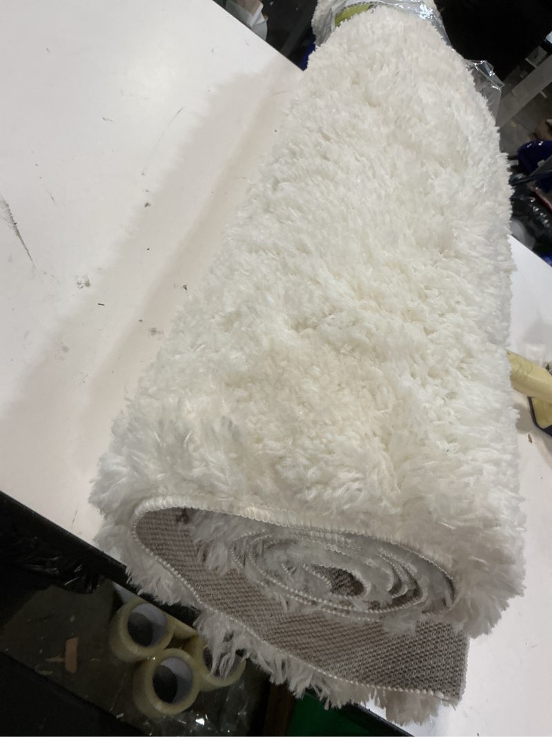 Condition photo showing As Is for 4'x5'6" cream plush shag washable accent rug - room essentials™