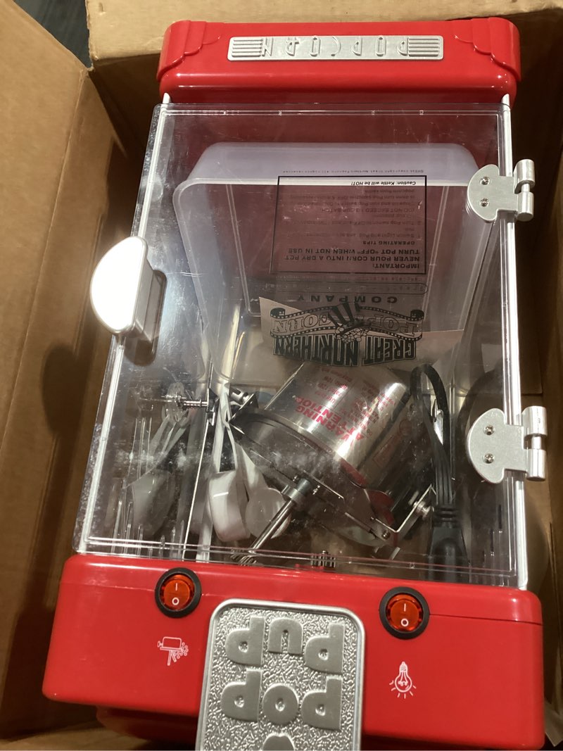 Condition photo showing As Is for Matinee Popcorn Machine - 8oz Popper with Stainless-Steel Kettle, Reject Kernel Tray, Warming Light, and Accessories by Great Northern Popcorn (Red)