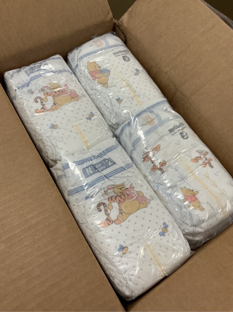 Condition photo showing New/Like New for Huggies Size 2 Diapers, Little Snugglers Baby Diapers, Size 2 (12-18 lbs), 84 Count, Packaging May V