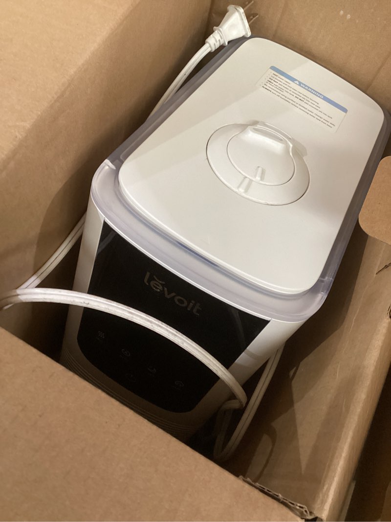 Condition photo showing As Is for LEVOIT 6L Smart Warm and Cool Mist Humidifiers for Home Bedroom, 60H Runtime and Auto Customized Humidity for Large room, Schedule, Easy Top Fill, Essential Oil Diffuser, Whisper-Quiet, Handle, Black Black 6L(powers on)