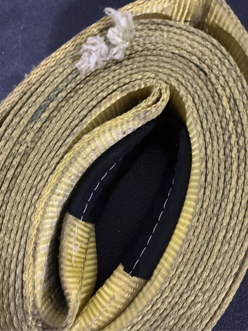 Condition photo showing As Is for tow strap tie down with loop break strength