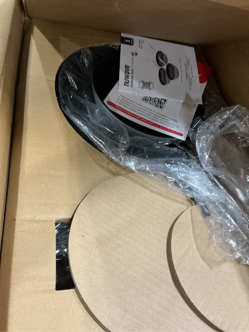 Condition photo showing New/Like New for nuwave 3-piece 8”, 10”, 12” forged lightweight frying pan set, g10 healthy duralon blue ceramic ultra non-stick, ergonomic stay-cool handles, induction-ready & works on all cooktops 3pc fry pan set cool gray