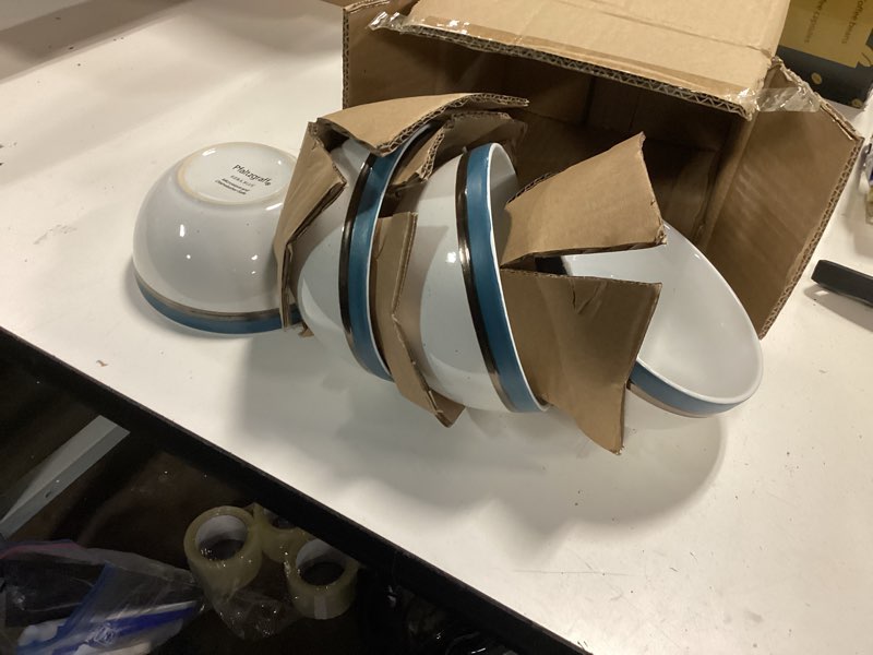 Condition photo showing New/Like New for pfaltzgraff ezra blue bowls 4pc