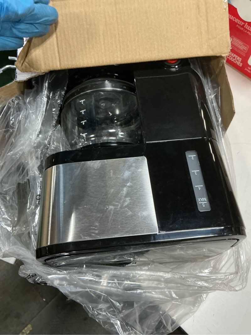 Condition photo showing As Is for elite gourmet ehc9420 automatic 5-cup brew & drip coffee maker with pause n serve reusable filter, on/off switch, water level indicator 5 cups stainless steel