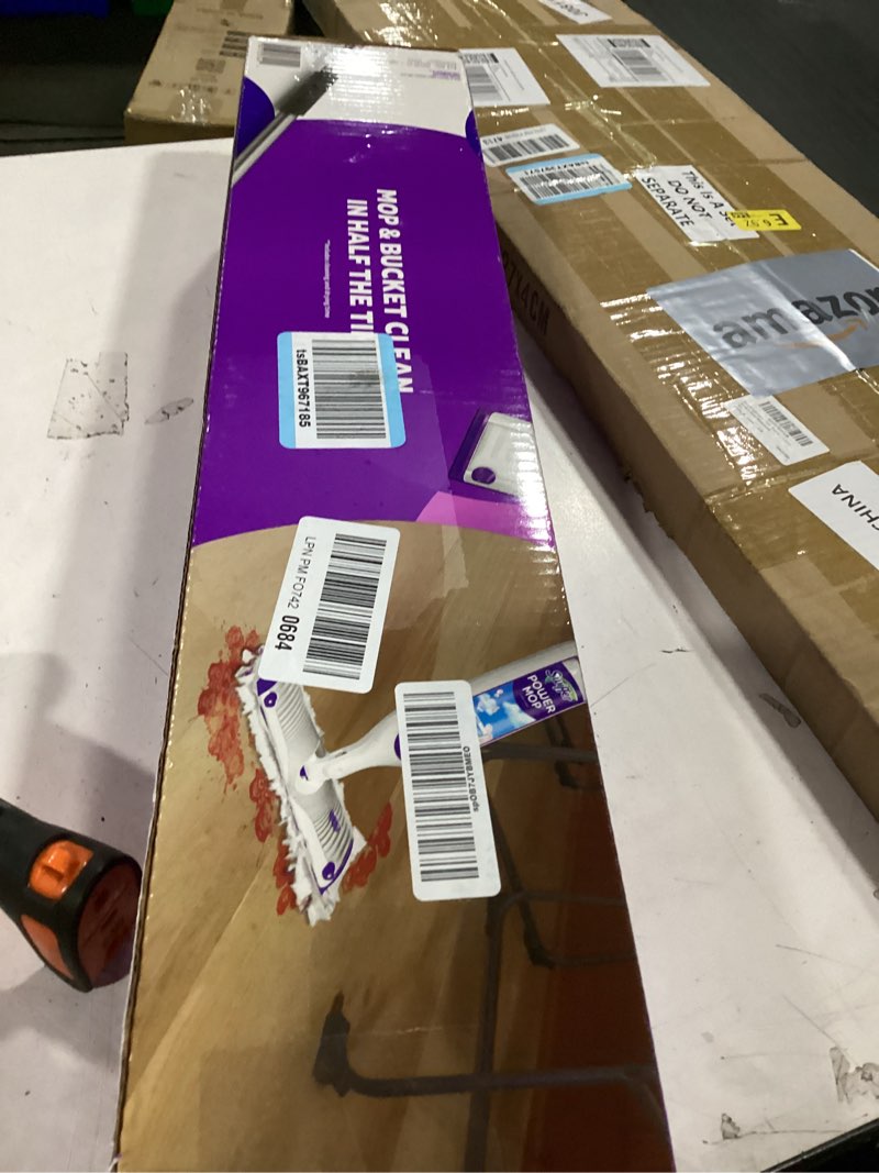 Condition photo showing New/Like New for swiffer powermop multi-surface mop kit for floor cleaning, includes powermop, 2 mopping pad refills, 1 cleaning solution with fresh scent and 2 batteries purple and white