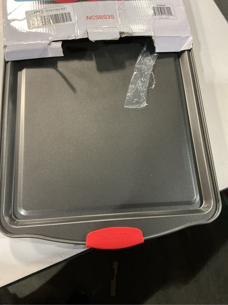 Condition photo showing Good Condition for NutriChef 3-Piece Nonstick Kitchen Oven Baking Pans - Premium & Stylish Non-Stick Steel, Commercial Grade Restaurant Quality Metal Bakeware with Red Silicone Handles - Easy to Clean, NCSBS3S 3-Piece Set