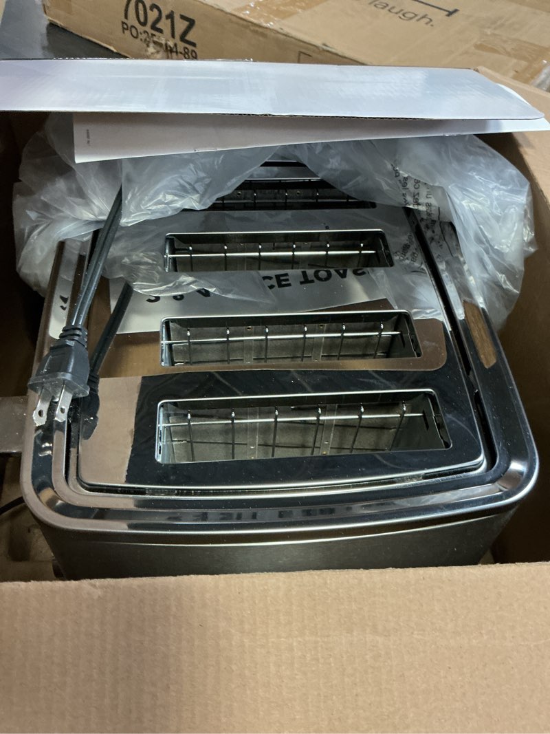 Condition photo showing As Is for GE Stainless Steel 4 Slice Toaster | Extra Wide Slots for Bagels, Breads, Waffles & More | 7 Shade Options | Countertop Kitchen Essentials | 1500 watt 4-Slice Stainless Steel