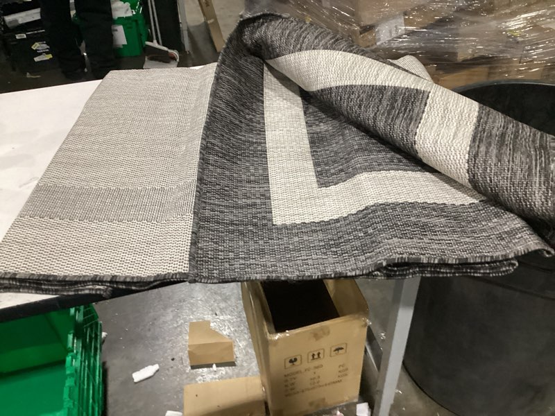 Condition photo showing Good Condition for CAMILSON Outdoor Rug 6x9,Modern Outside Rugs for Patios Porches Waterproof Durable Washable Non-Shedding, Easy-to-Clean Indoor Outdoor Area Carpet (6 x 9, Bordered - Dark Gray/Light Gray) Bordered - Dark Grey / Light Grey 6'7" x 9' (Rectangular)