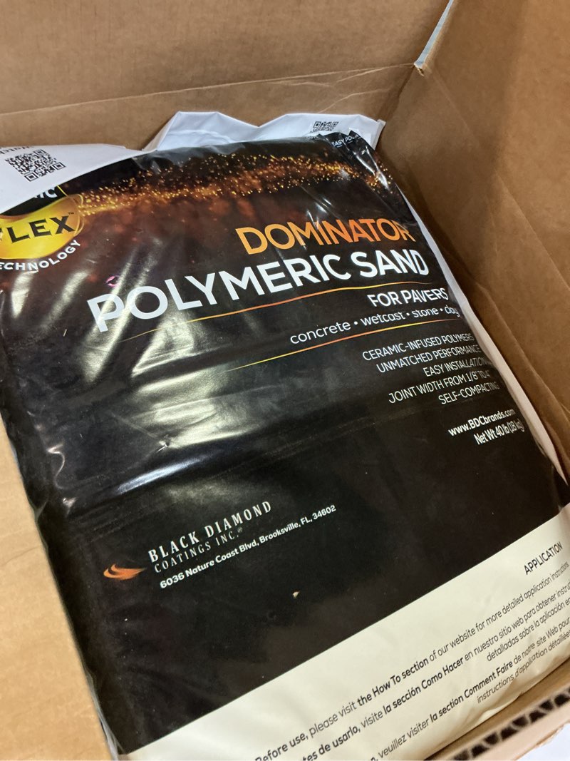 Condition photo showing New/Like New for 40 pound gray beige dominator polymeric sand with revolutionary ceramic flex technology for stabilizing paver joints/gaps, 1/8” up to 4”, professional grade results