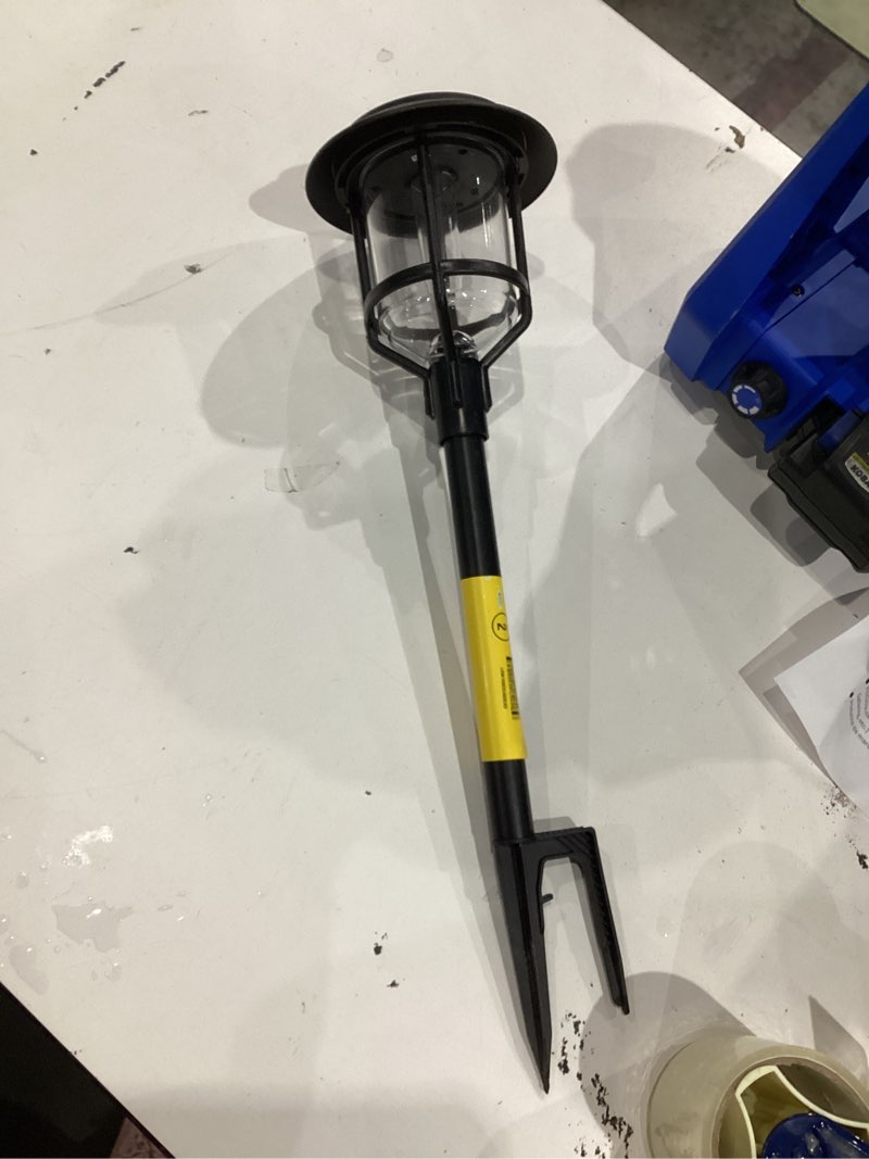 Condition photo showing As Is for lumens black solar led outdoor path light 3000-k