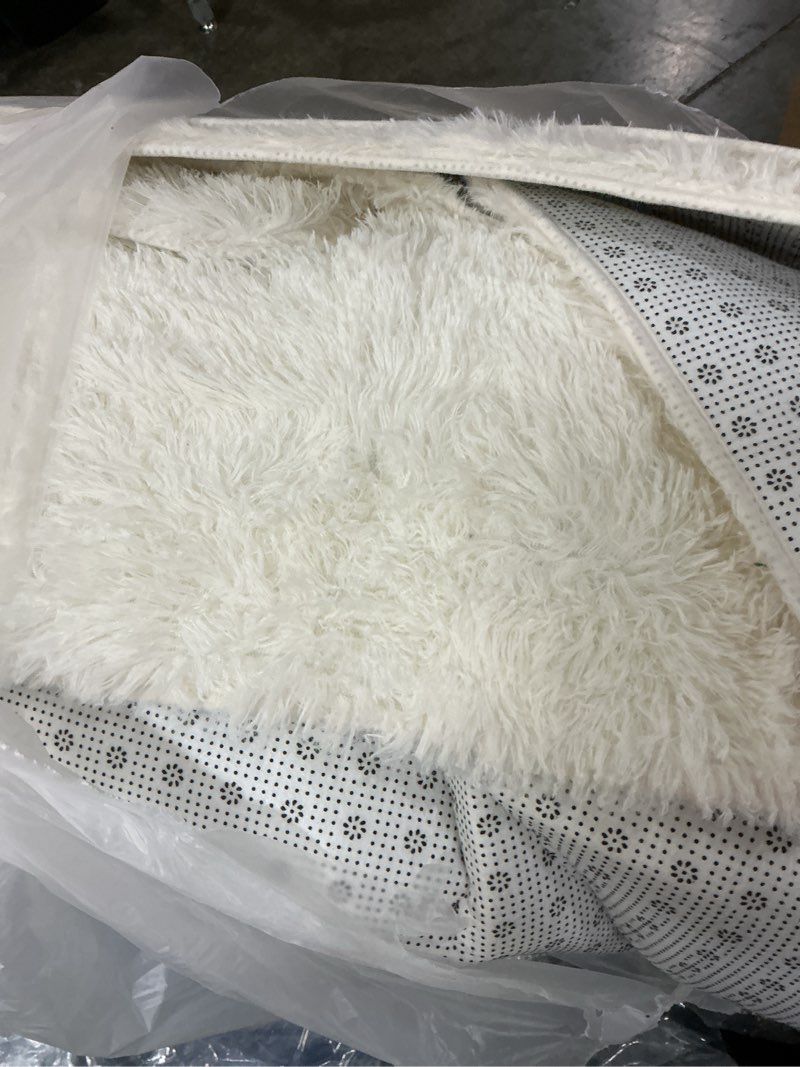Condition photo showing As Is for Ultra Soft Rugs for Living Room 6x9 White, Large Big Shag Area Rug for Bedroom Nursery, Modern Fluffy Plush Carpet for Girls Boys Kids Room Dorm Home Decor, Upgrade Non-Slip 6' x 9' (Rectangular) White