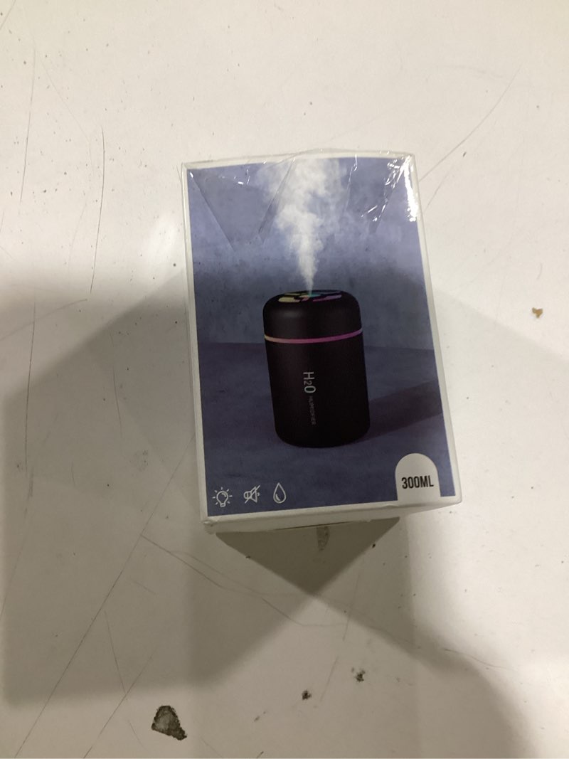 Condition photo showing New/Like New for Portable Mini Humidifier, 300ml USB Cool Mist Small Humidifier with Colorful Lights. Perfect for Bedroom, Office, Plants, travel & Car (Black)