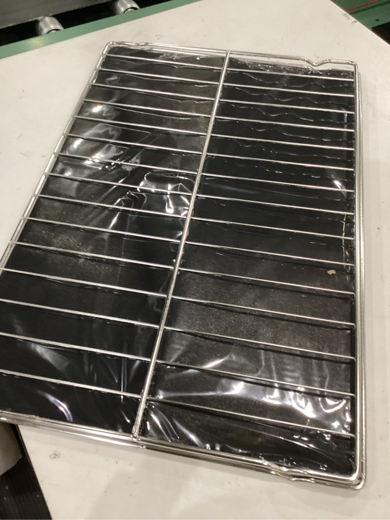 Condition photo showing Good Condition for adjustable extendable oven rack, universal chrome plated wire shelf, adjusts from 17" to 26" wide, compatible with ge, whirlpool, frigidaire, kenmore, samsung