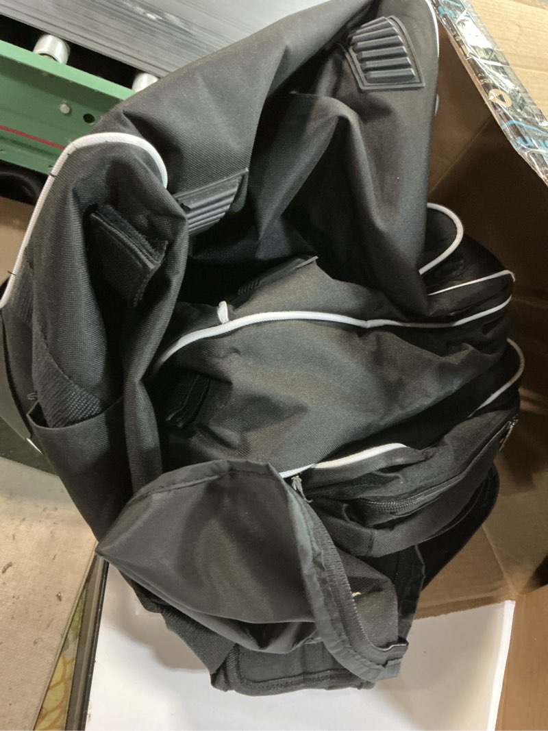 Condition photo showing Good Condition for partage hockey bag with wheels, 33" hockey duffle bag with separate shoe compartment (black)