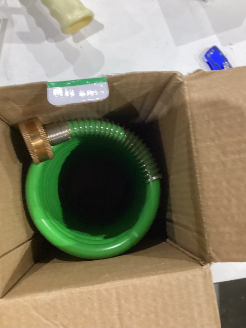 Condition photo showing As Is for rv exterior shower hose, 15ft green coil water hose with 1/2" quick connect adapter, recoils to 9", weather resistant recoil garden camper tube for rv outdoor shower, garden use, 3/4" fitting