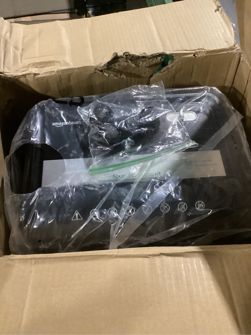 Condition photo showing Good Condition for Amazon Basics 12 Sheet High Security Micro Cut Paper, Credit Card and CD Shredder with 6 Gallon Easy Emptying Bin, Casters, Black
