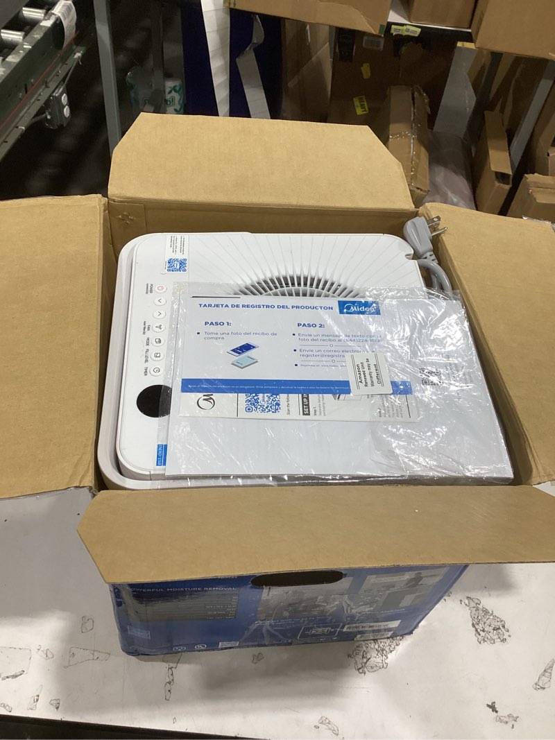 Condition photo showing As Is for midea cube 20 pint dehumidifier for basement, up to 1,500 sq. ft. dehumidifier with drain hose, energy star certificated, smart control, compatible with alexa, white