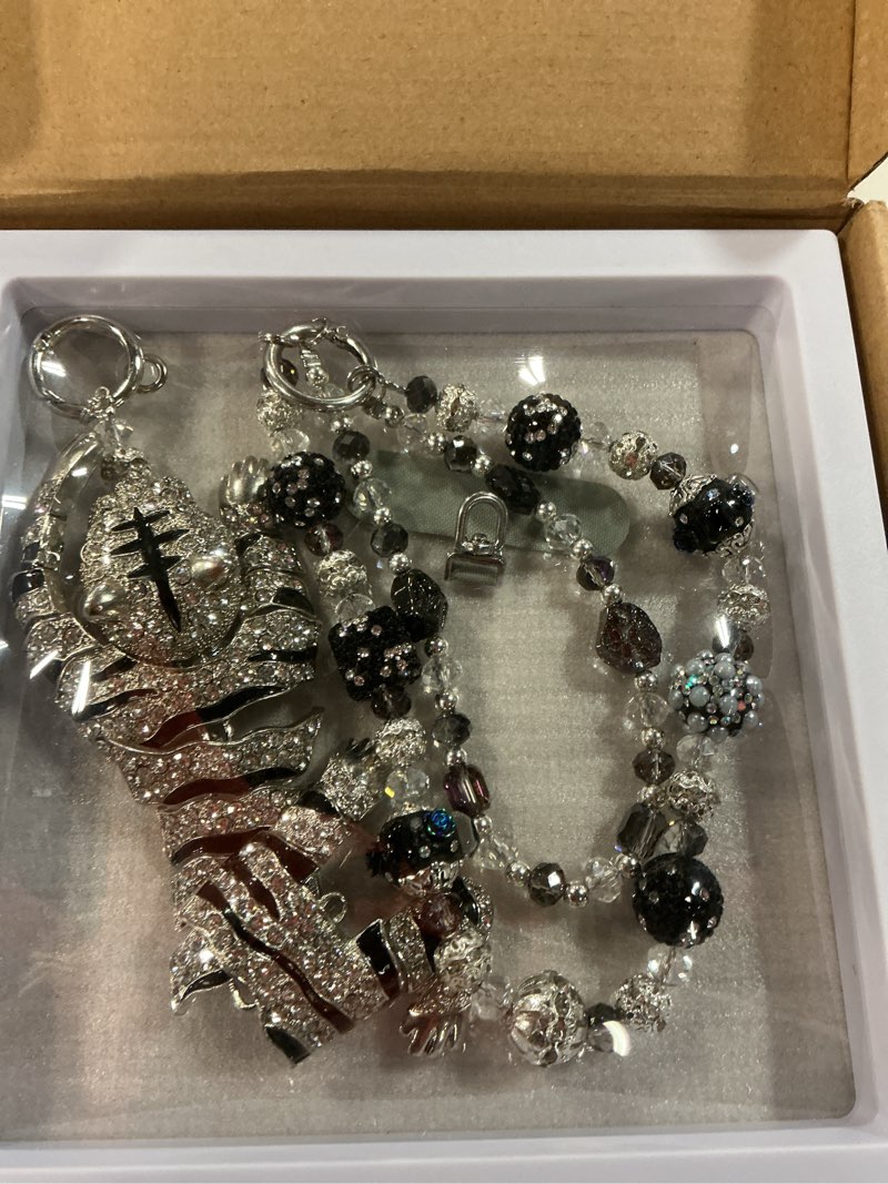 Condition photo showing As Is for xodito jewelry phone wrist strap white tiger phone charms anti-drop cellphone wristlet