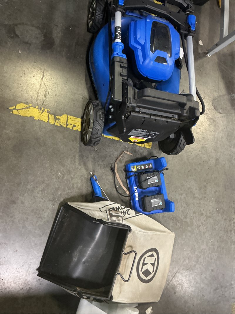 Condition photo showing As Is for kobalt 48-volt, 20-in cordless self-propelled lawn mower with (2) 24-volt, 5 ah battery included batteries included