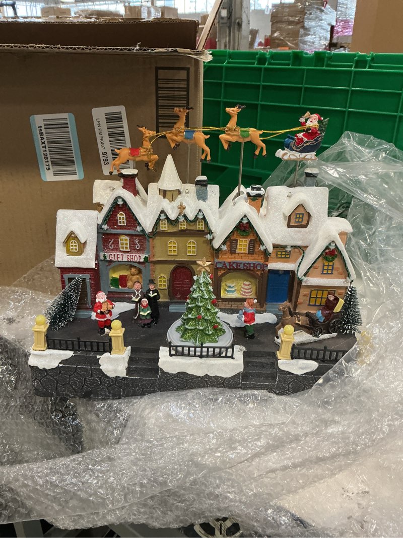 Condition photo showing Good Condition for WONDER GARDEN Christmas Village Houses with Santa Sleigh and Reindeer LED Light Christmas Houses Village Collectible Buildings, Musical and Battery Operated for Home Decor or Gift Shop
