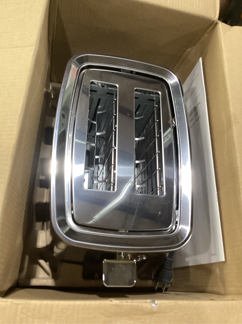 Condition photo showing Good Condition for ge 2 slice stainless steel toaster, extra wide slots for toasting bagels, breads, waffles & more, 7 adjustable shade settings, removable crumb tray, countertop kitchen essentials, 850 watts 2-slice stainless steel, not tested