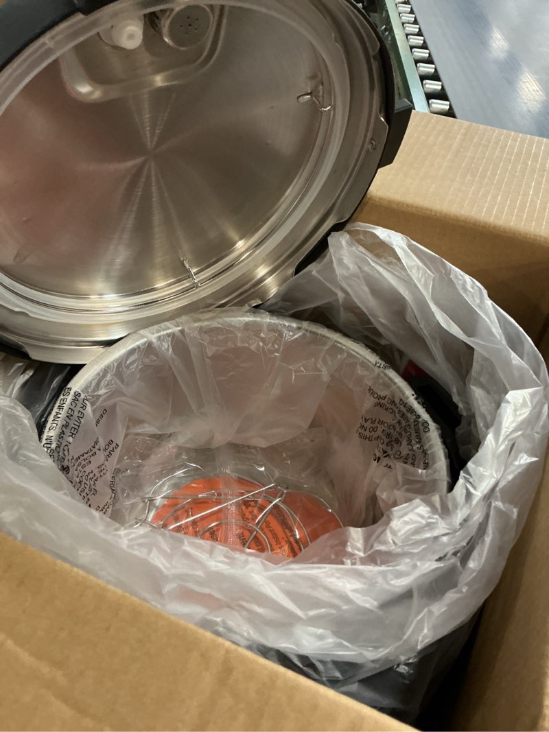 Condition photo showing As Is for instant pot, 6-quart whisper quiet 9-in-1 electric pressure cooker, slow rice steamer, sauté, yogurt maker, warmer & sterilizer, free app with 800+ recipes, stainless steel 6 quarts
